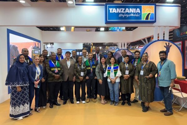 Tanzania tourism delegation receiving Excellence Awards at OTM 2026 in India for cultural and wildlife tourism promotion.