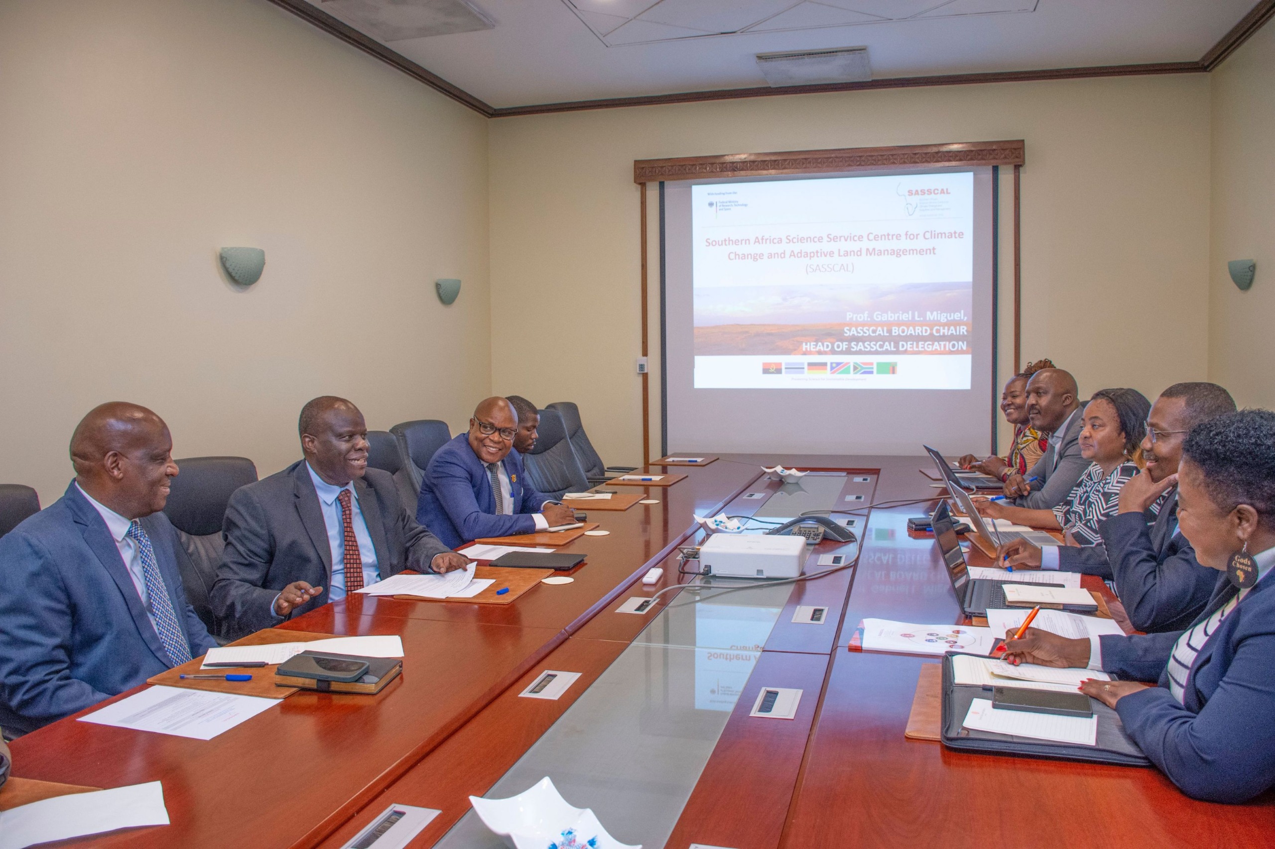 Dr. Richard Muyungi meeting with SASSCAL delegation in Dar es Salaam to discuss climate change research and sustainable land management cooperation.