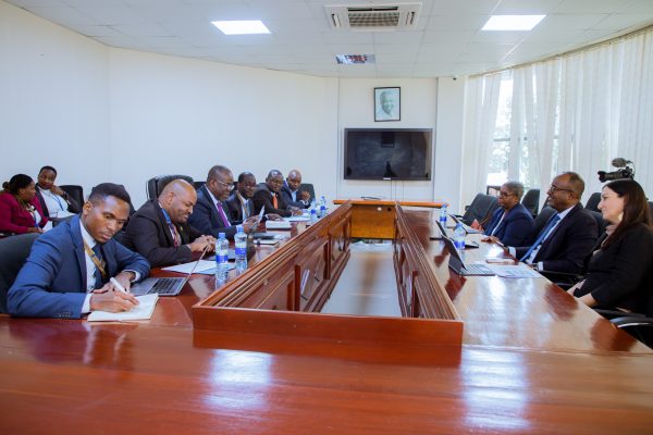 Minister of Finance Ambassador Khamis Mussa Omar meeting with World Bank Country Director Nathan Belete at the Treasury Square offices in Dodoma.