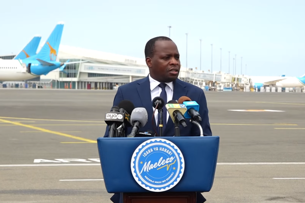 Chief Government Spokesperson delivering an official statement to the media on national matters in Tanzania.