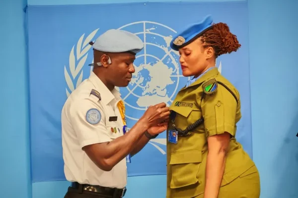 Tanzanian police peacekeepers standing in formation during a medal award ceremony recognizing their service in the United Nations mission in South Sudan.
