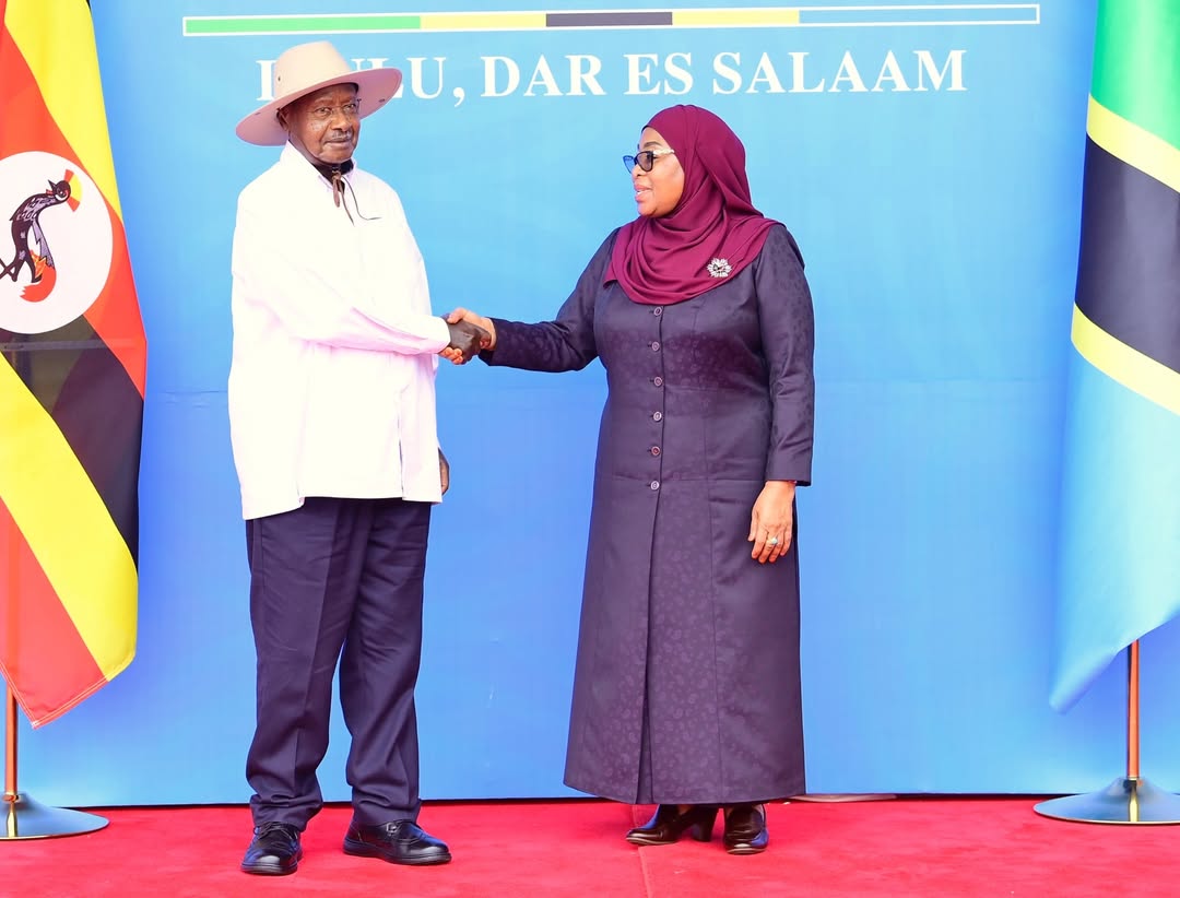 President Samia Suluhu Hassan poses for a group photograph with Ugandan President Yoweri Kaguta Museveni following his arrival at the State House grounds in Dar es Salaam on 7 February 2026.