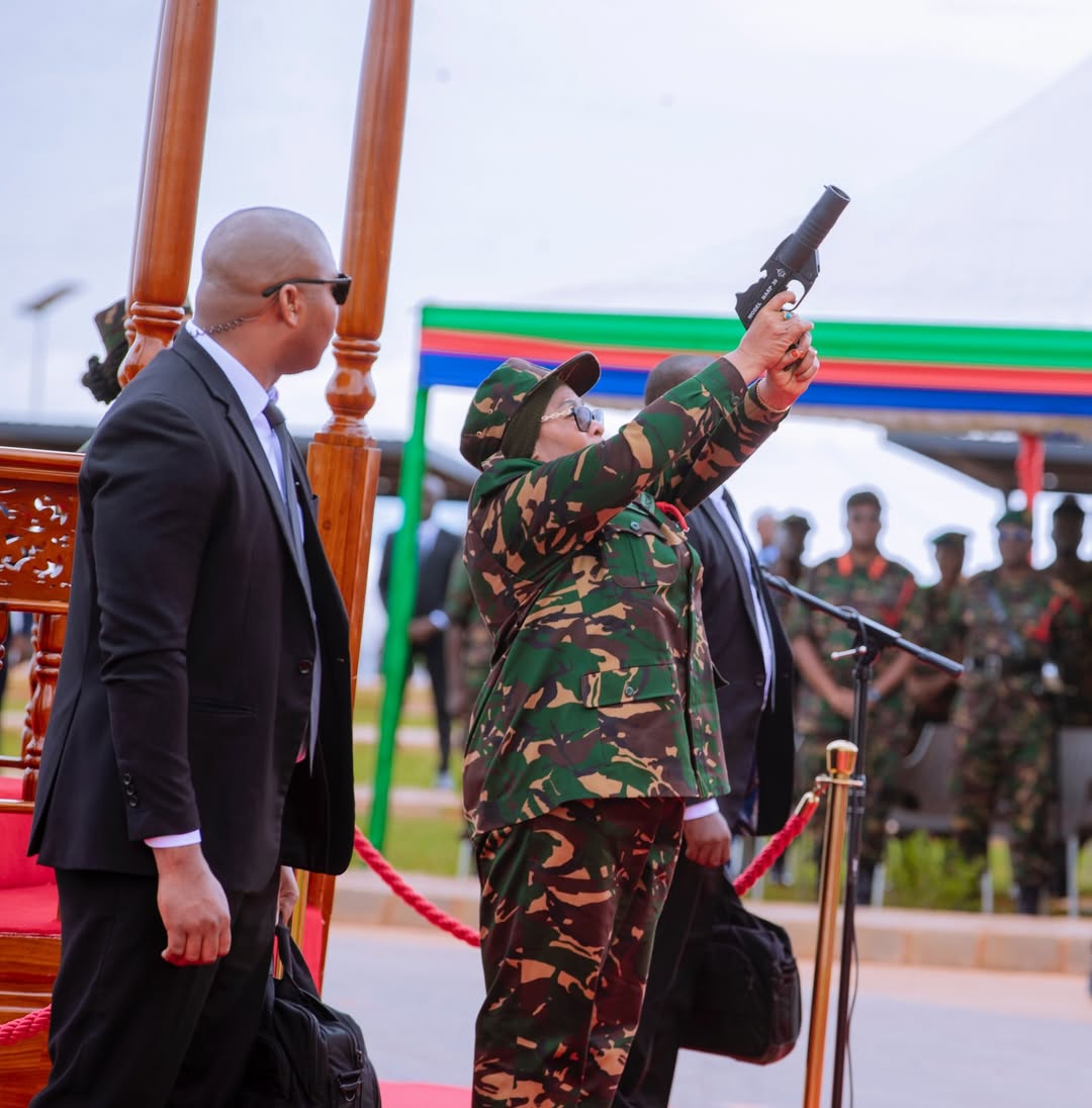 President Samia Suluhu Hassan firing a ceremonial light pistol to inaugurate the National Defence Headquarters (MMUT) building in Kikombo, Dodoma on 24 February 2026.