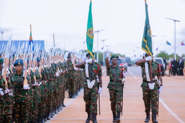President Samia Suluhu Hassan presiding over the inauguration ceremony of the National Defence Headquarters (MMUT) in Kikombo, Dodoma, with military honours and Guard of Honour present.