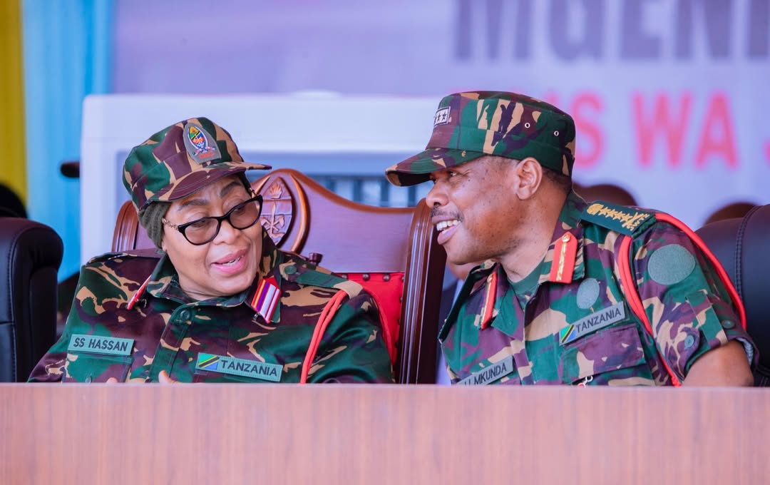 President Samia Suluhu Hassan speaks with Chief of Defence Forces Gen. Jacob John Mkunda during the inauguration of the National Defence Headquarters (MMUT) in Kikombo, Dodoma on 24 February 2026.
