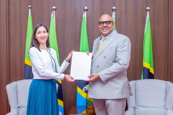 Minister Mahmoud Thabit Kombo receiving copies of the Letters of Credence from Hungary’s Ambassador-Designate Katalin Nyirati during a formal meeting in Dar es Salaam on 20 February 2026.