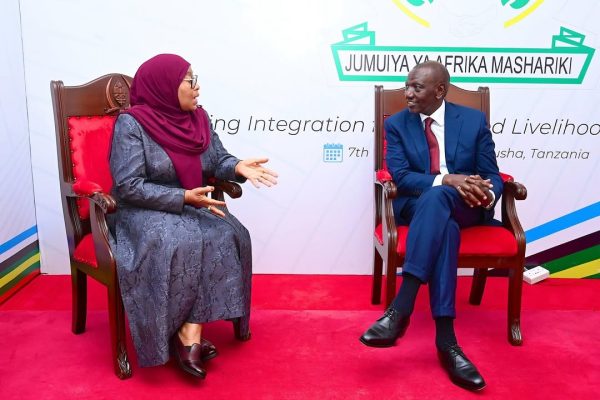 President Samia Suluhu Hassan speaking with Kenya’s President William Ruto ahead of the East African Community Heads of State meeting at the Arusha International Conference Centre.