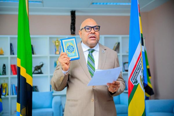 Tanzania’s Foreign Affairs Minister Ambassador Mahmoud Thabit Kombo taking the oath as an ex-officio member of the East African Legislative Assembly during a virtual special sitting of the Fifth Assembly.