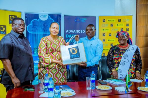 Tanzania parliamentary committee and communications minister during official visit to TTCL offices in Dar es Salaam