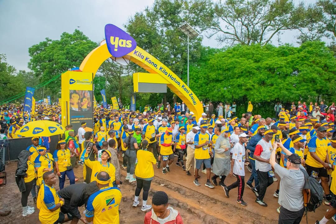 Runners participating in Kilimanjaro Marathon 2026 with Mount Kilimanjaro in the background showcasing Tanzania’s international sporting event