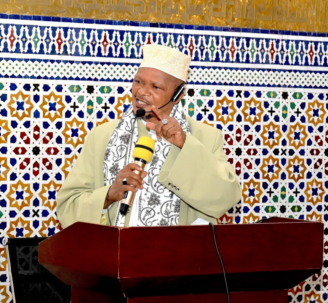 President Samia Suluhu Hassan attending Eid El-Fitr prayers at BAKWATA Grand Mosque in Dar es Salaam with Mufti Abubakar Bin Zubeir addressing worshippers