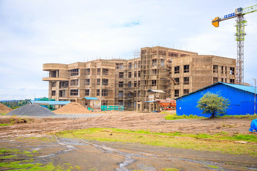 Foreign Affairs Minister Ambassador Mahmoud Thabit Kombo inspecting the construction site of the Mount Kilimanjaro International Conference Centre and the African Court office building in Arusha.