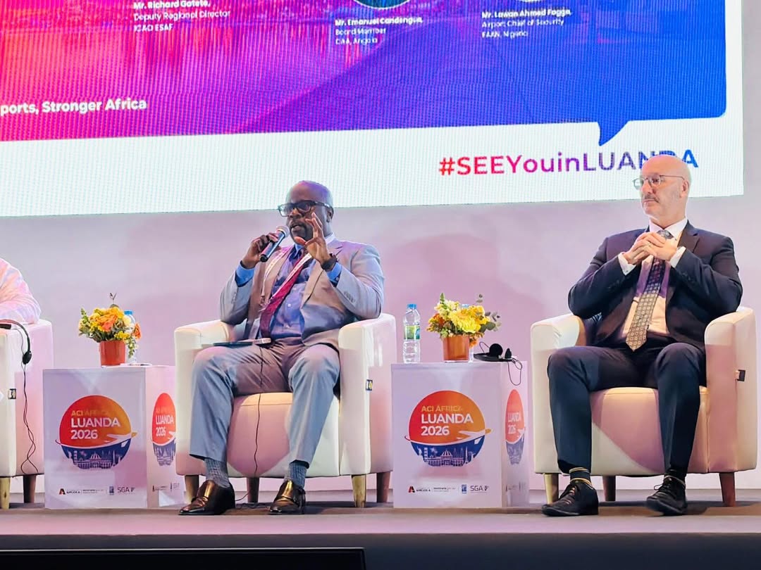 Tanzania Airports Authority Director General Abdul Mombokaleo speaking at ACI Africa Conference in Luanda on AI-driven aviation security systems