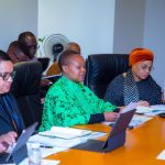 Ambassador Elsie Sia Kanza delivering a briefing at the IMF/World Bank Spring Meetings 2026 in Washington, D.C., highlighting Tanzania–US trade growth, AGOA extension, and increased American investment.