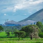 A modern stadium under construction in Arusha as part of Tanzania’s preparations to co-host the Africa Cup of Nations 2027, highlighting ongoing infrastructure development.