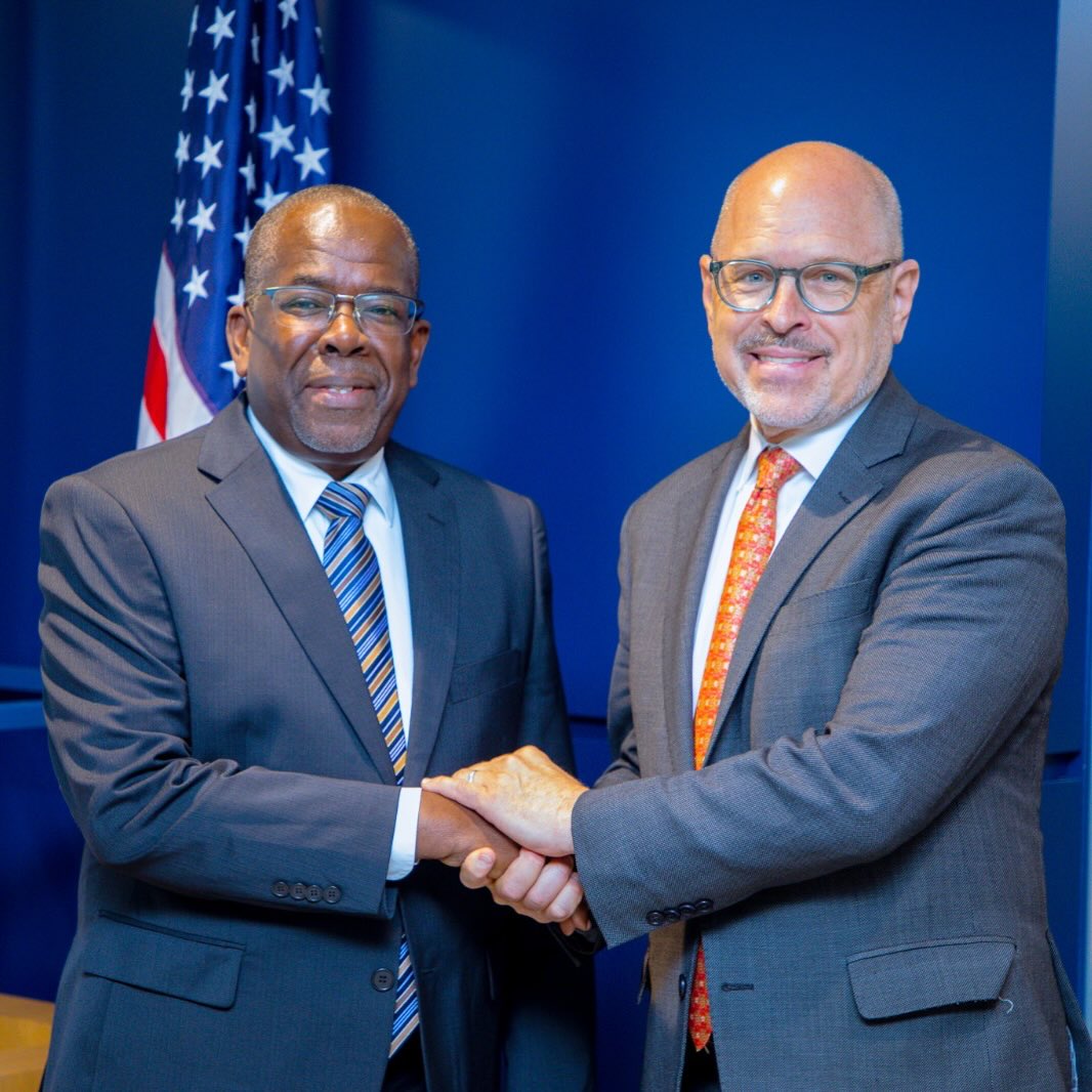 Tanzania’s Finance Minister Khamis Mussa Omar meeting BCIU CEO Peter Tichansky in Washington, D.C., discussing investment opportunities in agriculture, healthcare, and infrastructure sectors.