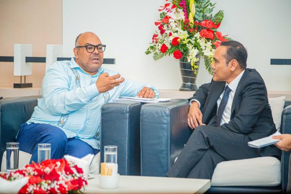 Mahmoud Thabit Kombo meets Zhulkarnain Abdul Rahim in Port Louis during the Indian Ocean Conference to discuss strengthening Tanzania–Singapore relations.