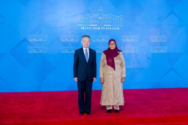 President Samia Suluhu Hassan posing for a photograph with Chinese official Liu Haixing at the State House in Dar es Salaam following diplomatic discussions.