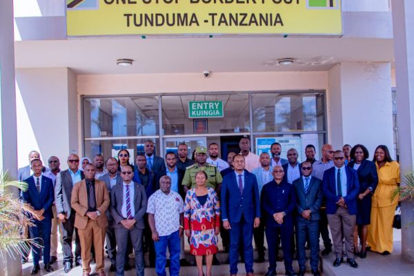 Senior government officials from Tanzania and Zambia during Joint Trade Committee preparations at the One Stop Border Post in Tunduma, discussing regional trade and economic cooperation.