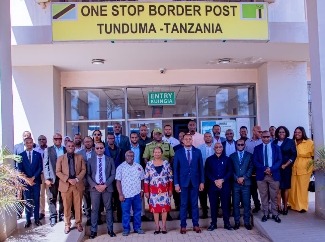 Senior government officials from Tanzania and Zambia during Joint Trade Committee preparations at the One Stop Border Post in Tunduma, discussing regional trade and economic cooperation.