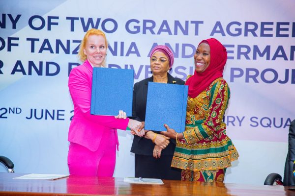 Permanent Secretary and Paymaster General Dr. Natu El-Maamry Mwamba and KfW Tanzania Director Vanessa Eidt sign a €20 million grant agreement to improve water supply and sanitation services in Songwe Region, Tanzania.