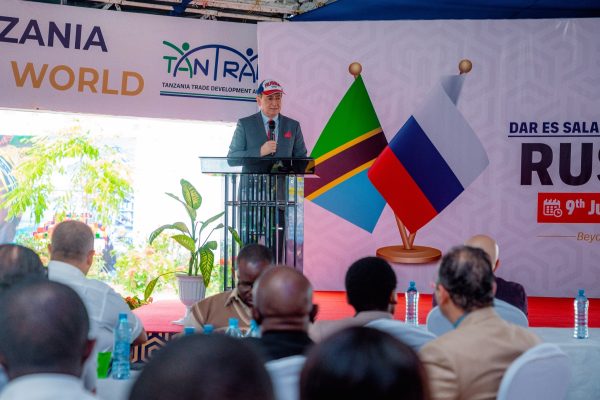 Russia Day celebration at the 50th Dar es Salaam International Trade Fair featuring Tanzanian and Russian officials promoting bilateral trade and investment.